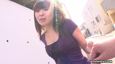 Cute asian toying on a rooftop