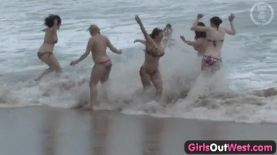 Sexy Aussie lesbian amateurs having an orgy on the beach