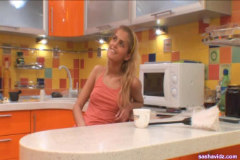 Kitchen solo time for this sexy blonde teen