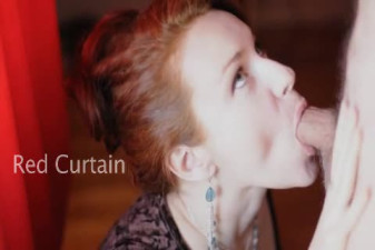 Hot redhead eating a hard peach