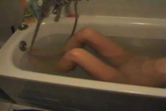 Busty teen blonde masterbates in tub