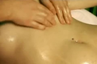 Oiled up teen gets a sensual massage