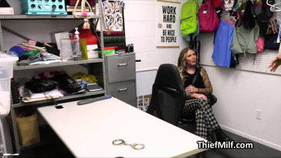 Busty tattoo artist sucks cop's dick in the backroom